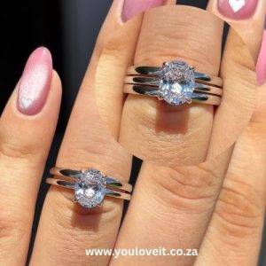The Elegant S925 Sterling Silver 2.00 ct. Clear Oval Wedding Ring Set