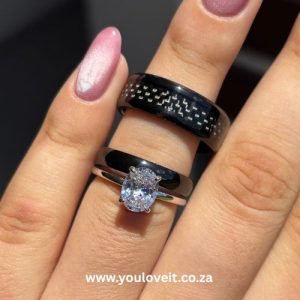 The 2.00 ct. Oval Cut Carbon Fiber Couples Wedding Ring Set