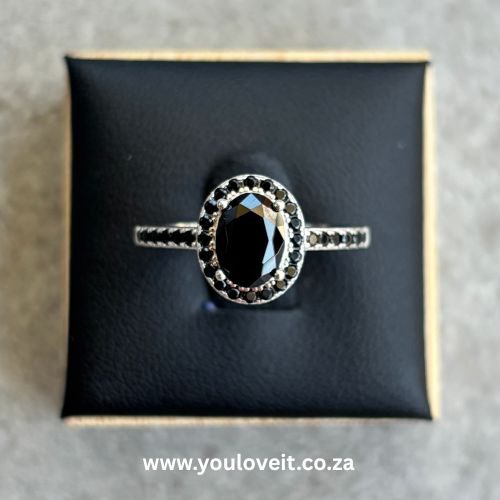 The Sterling Silver 1.25 ct. Vintage Black Oval Cut Halo Engagement Ring