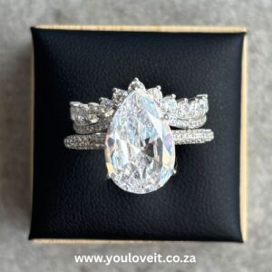 The Sterling Silver 5.75 ct. Magnificent Pear Tiara Wedding Ring Set