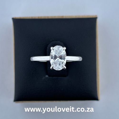 The Sterling Silver 1.41 ct Oval Cut Solitaire Engagement Ring With Hidden Halo