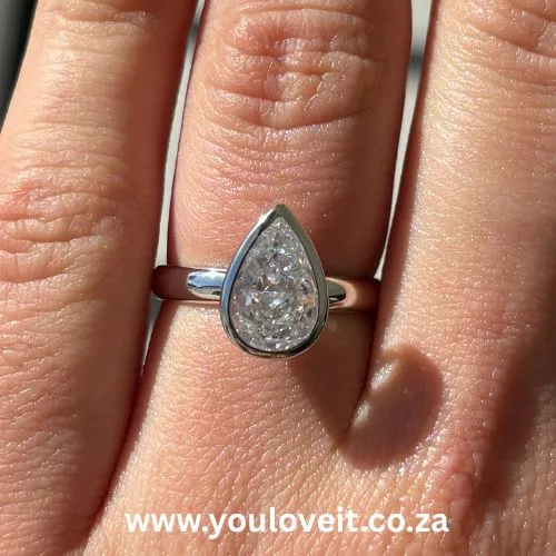 The Sterling Silver Bezel Setting 3.00 ct Pear Cut Engagement Ring